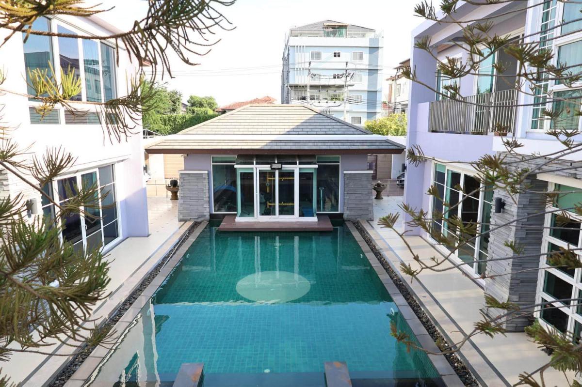 6910-104 ขาย บ้านสไตล์ Pool Villa เนื้อที่ 1 ไร่ ติดถนนเลียบทางด่วนรามอินทรา ซอยตัน น้ำไม่ท่วม